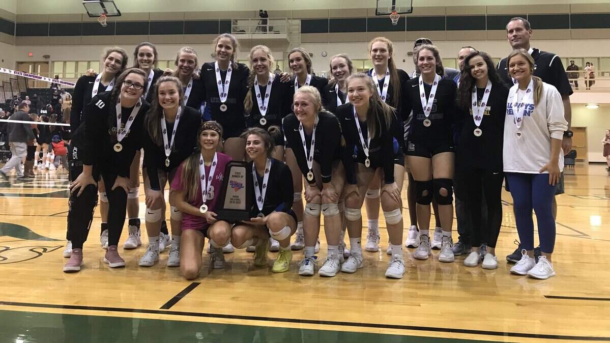 Lexington volleyball team poses with its runner-up trophy after losing to Nation Ford in the Class 5A championship on Nov. 9, 2019.