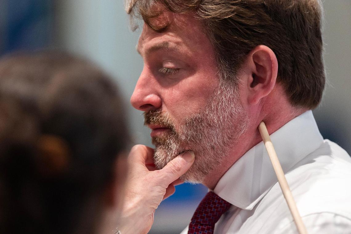 Dr. Ellen Riemer, forensic pathologist, demonstrates on defense attorney Phillip Barber where she determines a gunshot injured Paul Murdaugh during Alex Murdaugh’s trial for murder at the Colleton County Courthouse on Tuesday, February 14, 2023. Joshua Boucher/The State/Pool