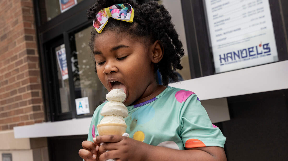 Kennedi Smith, 4, enjoys a vanilla cone at Handel’s Homemade Ice Cream in Forest Acres.
