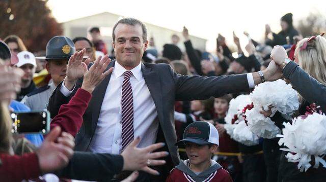 South Carolina head coach Shane Beamer greets fans on his arrival at Williams-Brice Stadium before an NCAA college football game against Clemson Saturday, Nov. 27, 2021, in Columbia, S.C. (AP Photo/Sean Rayford)