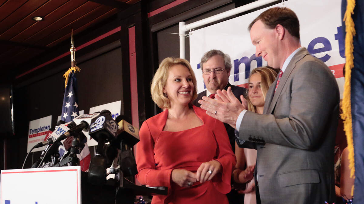 Republican gubernatorial candidate Catherine Templeton stands next to running mate Walt Wilkins, right, in front of supporters during the South Carolina Primary, Tuesday, June 12, 2018 at the Liberty Tap Room in Columbia, S.C. (Tracy Glantz/The State)