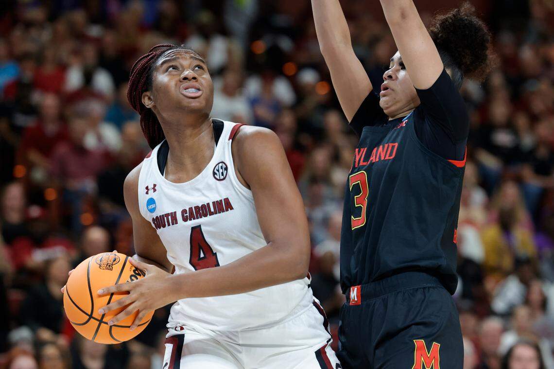 South Carolina Gamecocks forward Aliyah Boston (4) is defended by Maryland Terrapins guard Lavender Briggs (3) at the Bon Secours Wellness Arena in Greenville, South Carolina on Monday, March 27, 2023.
