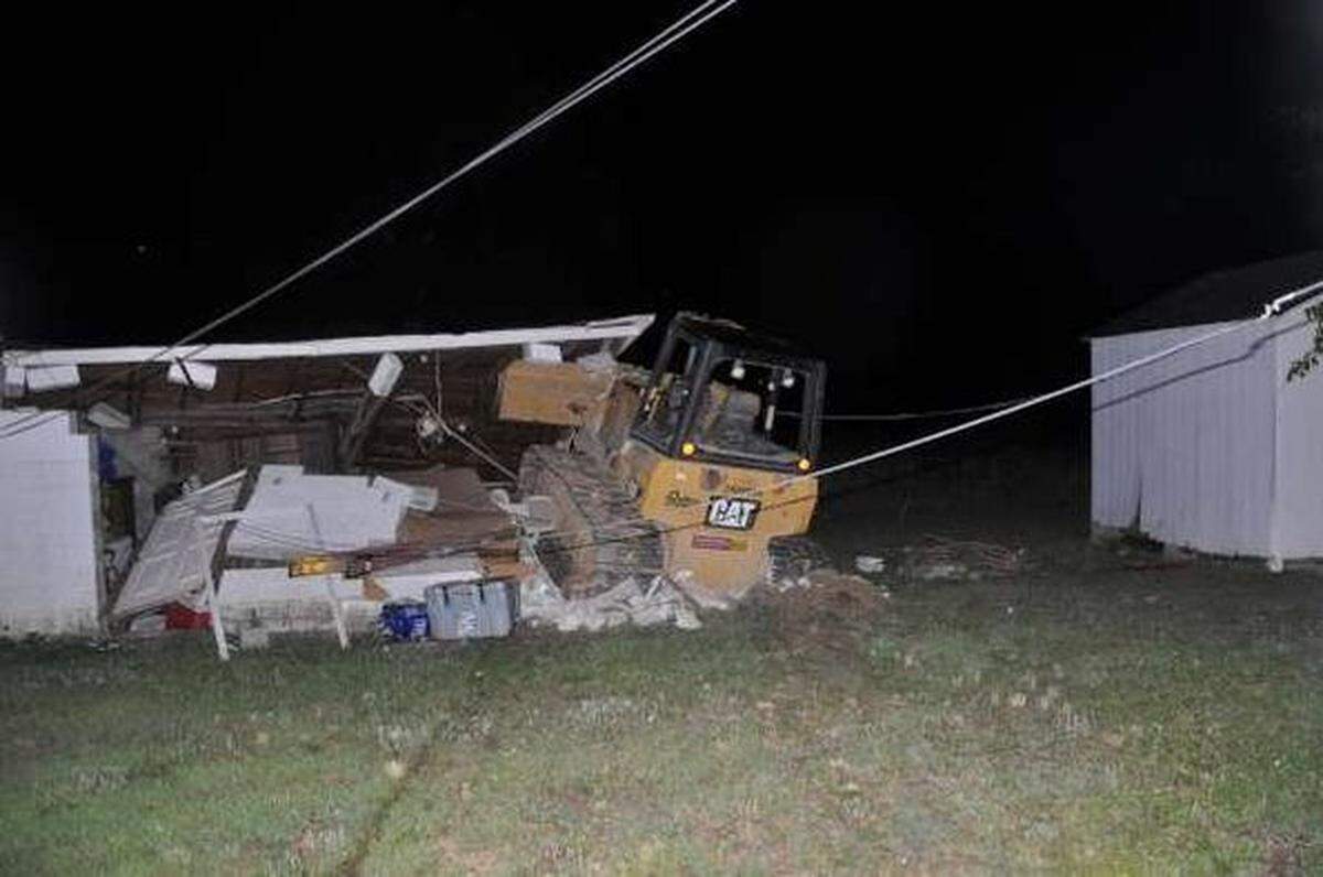 A stolen bulldozer was driven onto a house in the Midlands, the sheriff’s office said.