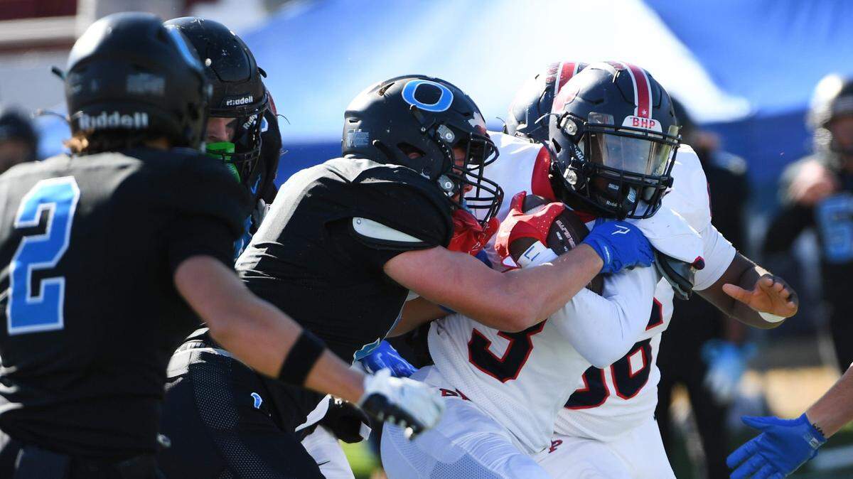 Belton-Honea Path High senior Marquise Henderson (3) moves the ball down field in heavy traffic against Oceanside Collegiate in the Class 3A championship game.