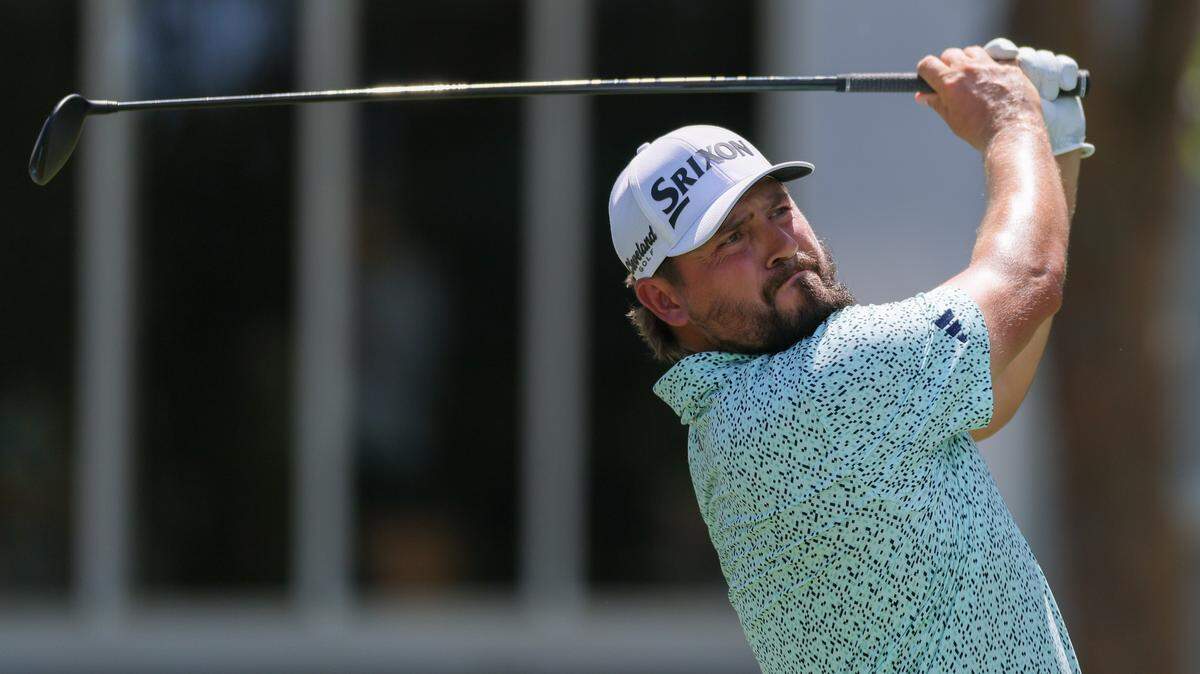 Andrew Novak drives off the 8th tee box during the first round of the Wyndham Championship golf tournament in July.