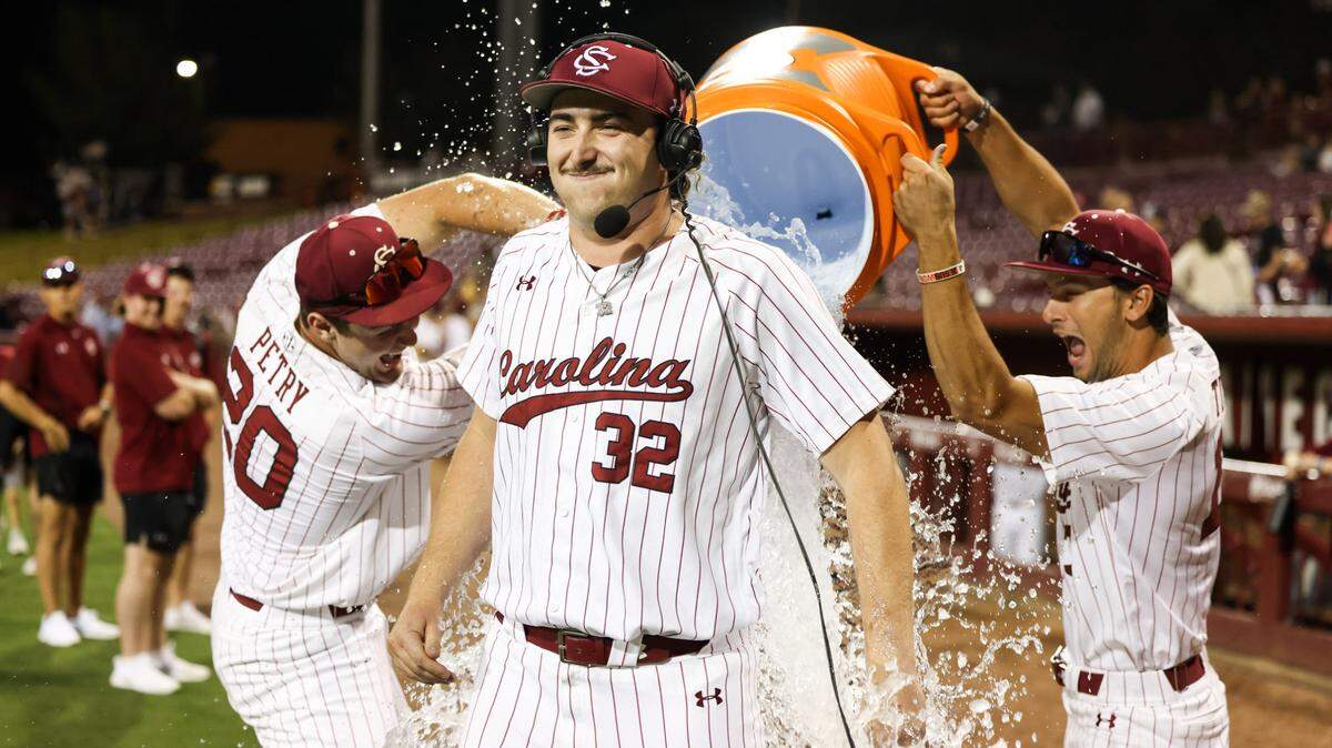 South Carolina pitcher Brandon Stone (32) is doused with water following the Gamecocks’ win over Ole Miss at Founders Park in Columbia on Thursday, April 17, 2025.