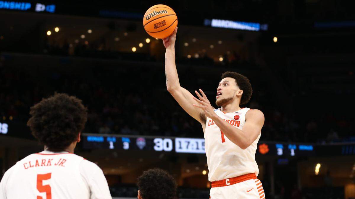 Mar 22, 2024; Memphis, TN, USA; Clemson Tigers guard Chase Hunter (1) shoots against the New Mexico Lobos during the second half of the NCAA Tournament First Round at FedExForum. Mandatory Credit: Petre Thomas-USA TODAY Sports