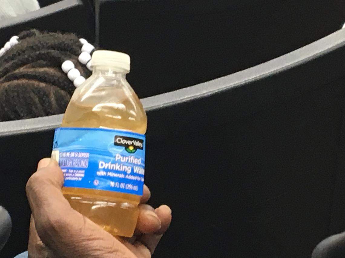 This bottle contains water a Denmark resident says he pulled from the tap in his home. Denmark residents have complained for years about discolored water.