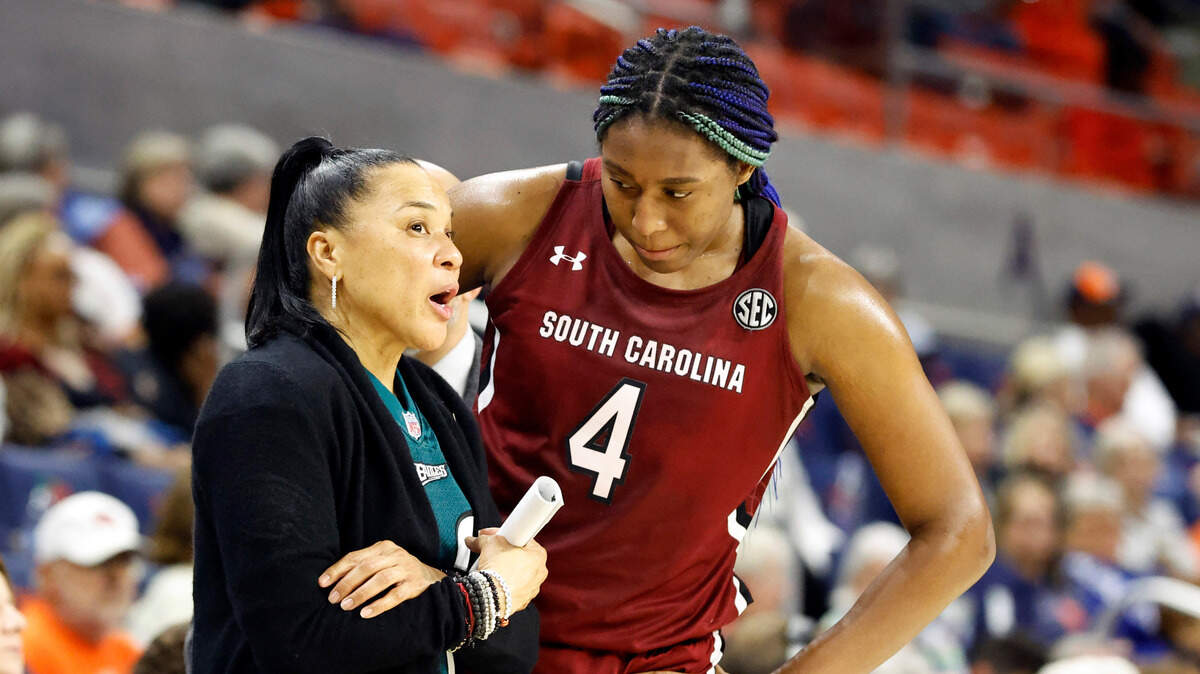 South Carolina head coach Dawn Staley, left, talks with forward Aliyah Boston (4) during the second half of an NCAA college basketball game against Auburn, on Feb. 9, 2023, in Auburn, Ala.