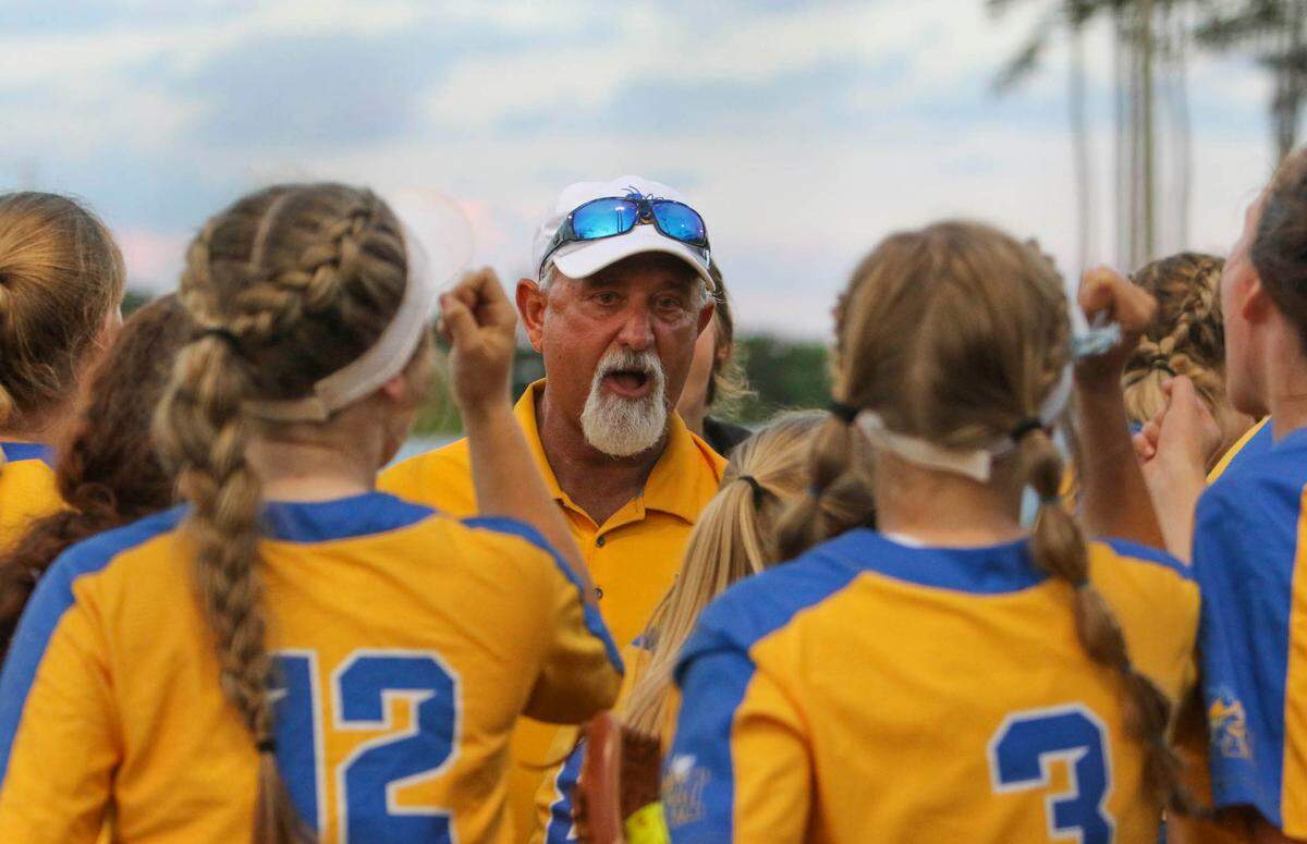 Fort Mill coach Chuck Stegall talks to his players during the class 5A softball championship against Lexington at Blythewood High on Friday, May 27, 2022.