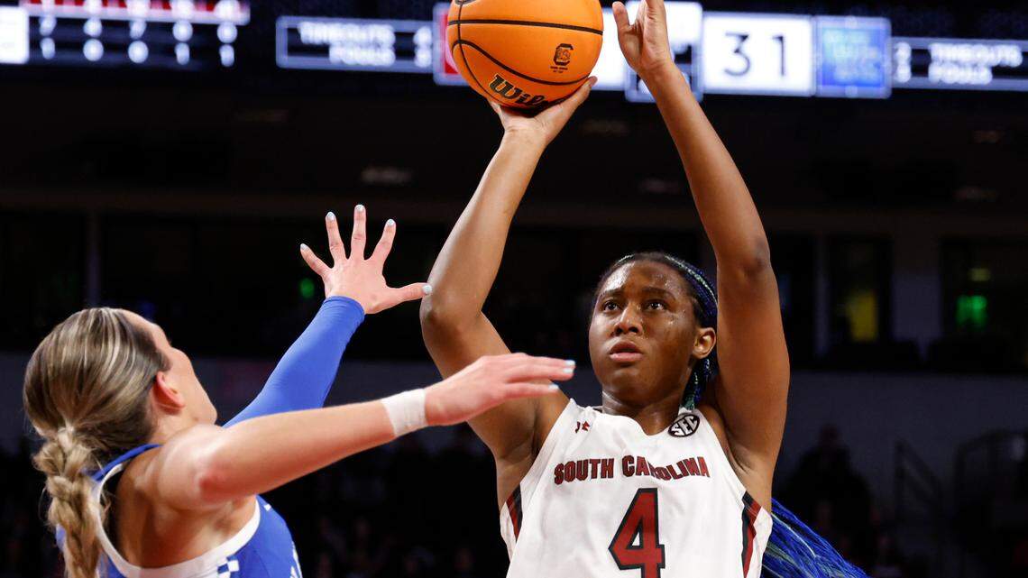 South Carolina forward Aliyah Boston (4) shoots over Kentucky guard Maddie Scherr, left, during the first half of an NCAA college basketball game in Columbia, S.C., Thursday, Feb. 2, 2023. (AP Photo/Nell Redmond)