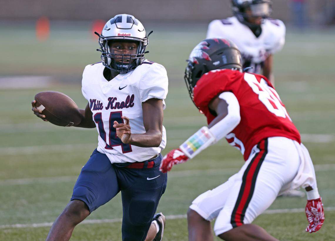 White Knoll wide receiver Jackson Lee (14) carries the ball during the Lexington 1 Sports-A-Rama Jamboree.