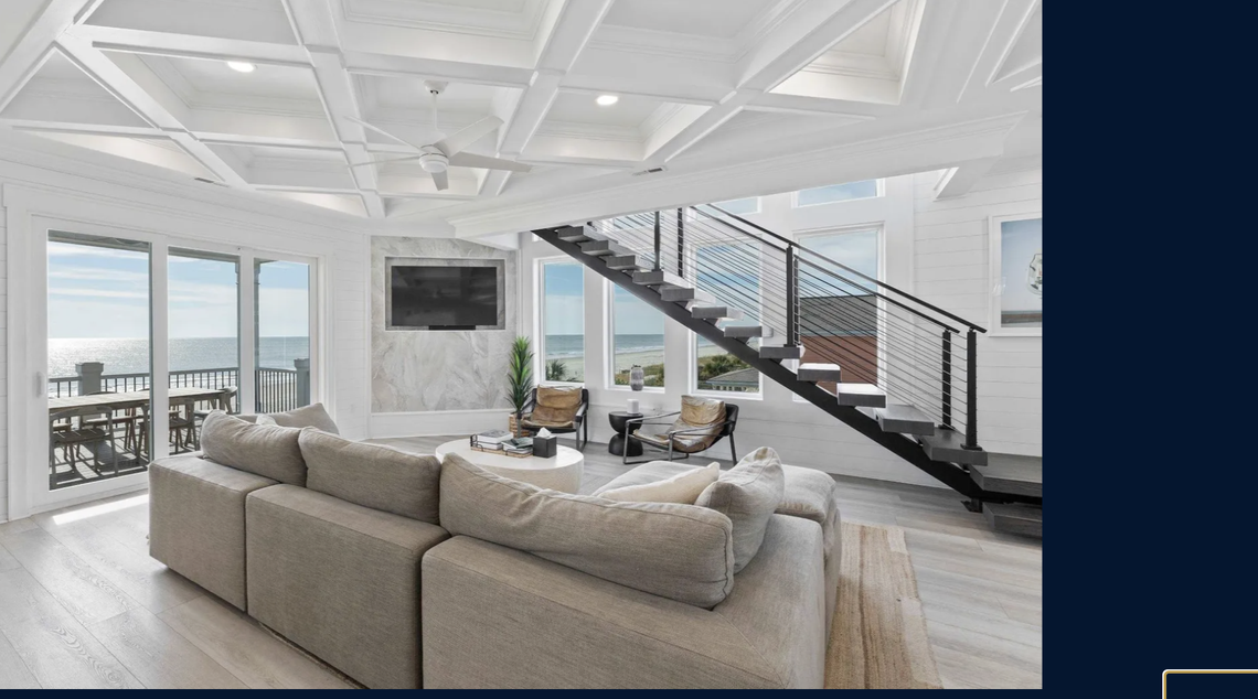 The open concept living dining area has ocean views.