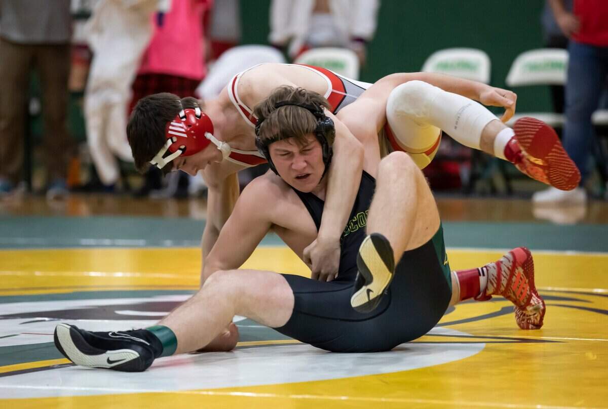 Leo Addeo of the Hammond School tries to bring down Burton Brewer of Ben Lippen during the SCISA 2022 Duals State Wrestling Tournament at Ben Lippen on Saturday, February 5, 2022.