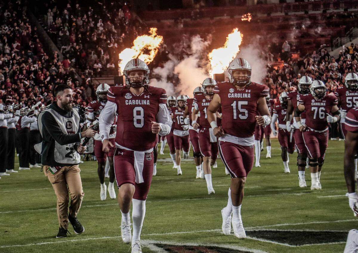 South Carolina quarterbacks Zeb Noland (8) and Jason Brown (15) run onto the field before the Gamecocks take on Florida on Saturday, Nov, 6, 2021 at Williams-Brice Stadium.