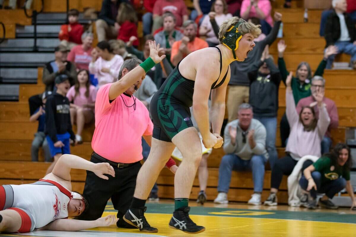Trey Talbert of Ben Lippen celebrates after pinning Nolan Addeo of the Hammond School in the SCISA 2022 Duals State Wrestling Tournament at Ben Lippen on Saturday, February 5, 2022.