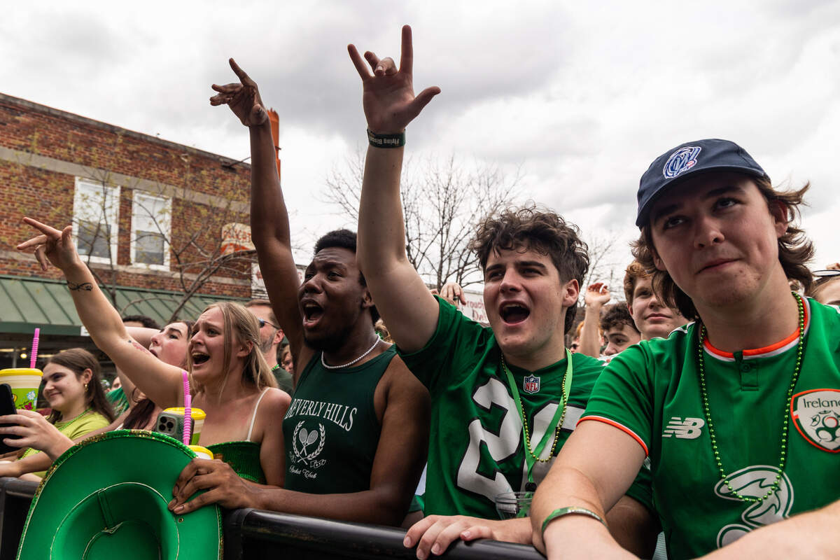 People listen to Bombargo, a band from Saskatoon, Saskatchewan, during the St. Pat’s in Five Points festival in Columbia, South Carolina on Saturday, March 15, 2025.