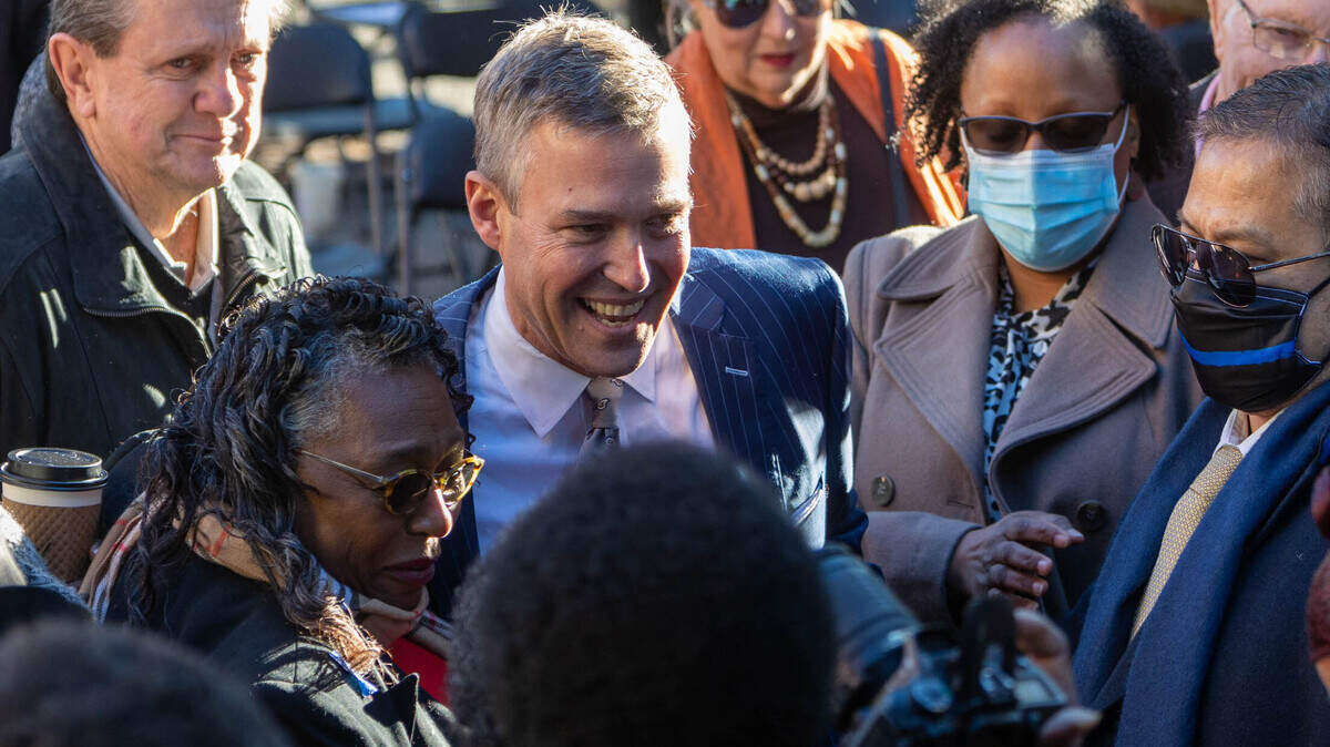 Daniel Rickenmann greets people and is photographed after gbeing sworn in as Columbia’s new mayor during an inauguration ceremony on Main Street in Columbia on Tuesday, Jan. 4, 2022.