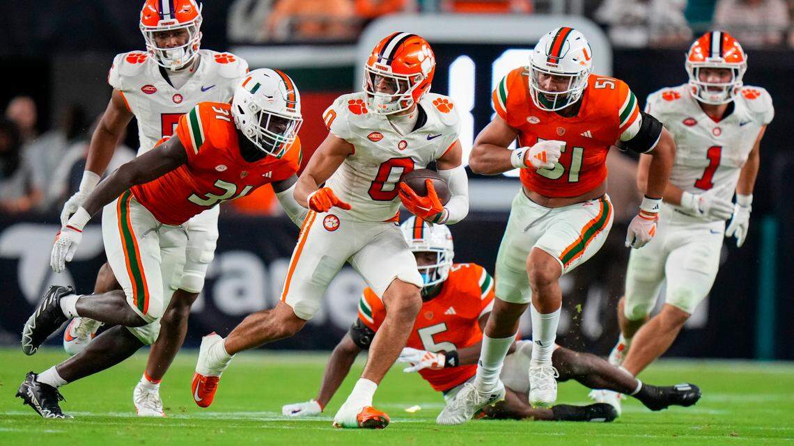 Oct 21, 2023; Miami Gardens, Florida, USA; Clemson Tigers wide receiver Antonio Williams (0) runs the ball against the Miami Hurricanes during the second quarter at Hard Rock Stadium.