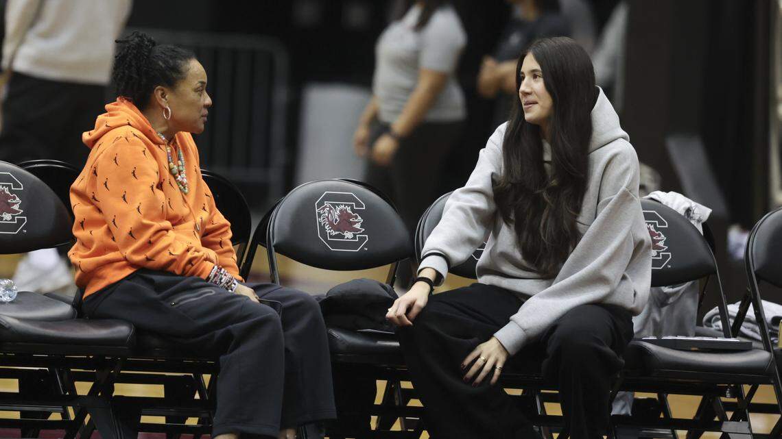 Alicia Tournebize sits on the bench with South Carolina's head coach Dawn Staley after South Carolina’s basketball practice on Friday, Jan. 2, 2026. The Gamecock’s newest team member recently arrived in the state from France.