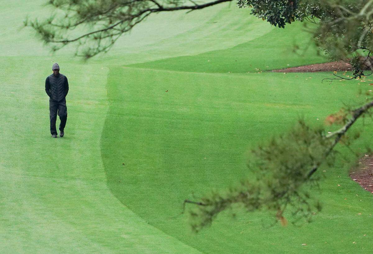 Tiger Woods walks down the no. 10 fairway during the third round of The Masters golf tournament.