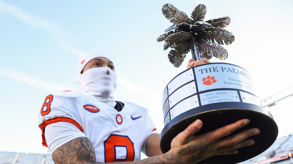 Clemson cornerback Avieon Terrell (8) carries the Palmetto Bowl trophy following of South Carolina’s loss to Clemson at Williams-Brice Stadium in Columbia on Saturday, November 29, 2025.


