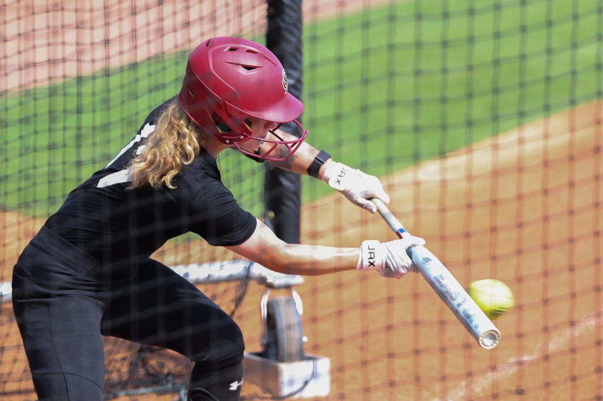 University of South Carolina’s Emily Vinson (17) bunts during practice at the Carolina Softball Stadium before the NCAA Columbia Regional on Thursday, May, 15, 2025.