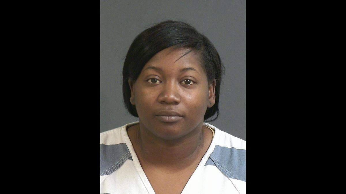 Shareatha Monique Generic Price, 26, was arrested and charged Thursday. Police say she hit a South Carolina school crossing guard and kept driving in January.
