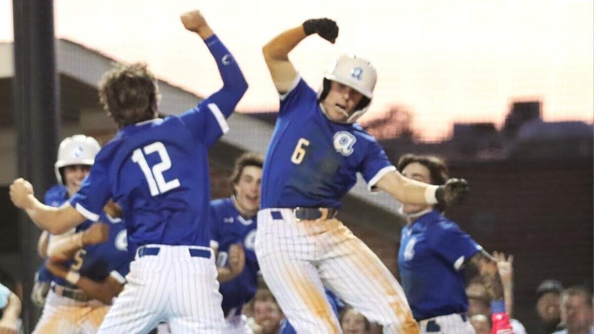 Airport’s Brice Gillette (12) and Landon Jeffcoat (6) celebrate after Gillette hit a grand slam in the seventh inning in Game 2 of the Class 4A Lower State championship series against South Florence.