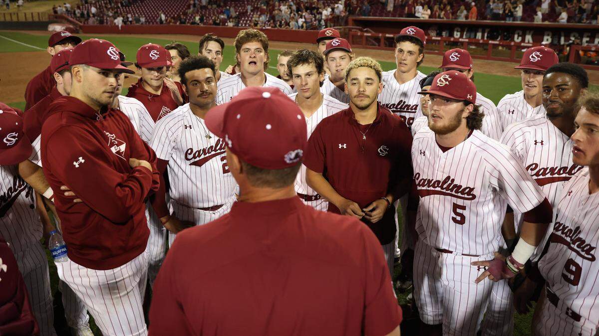 South Carolina head coach Mark Kingston speaks with his team following the Gamecocks’ game against Missouri at Founders Park in Columbia on Friday, March 24, 2023.