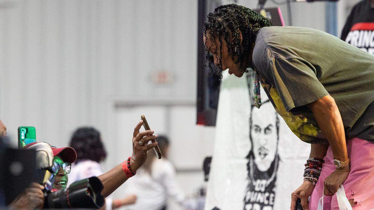Fans speak with South Carolina women’s head basketball Coach Dawn Staley during the Columbia Black Expo at the South Carolina State Fairgrounds on Saturday, May 16, 2026.