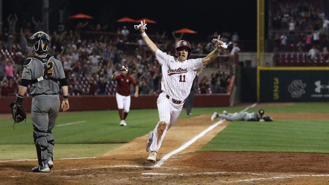 South Carolina outfielder Caleb Denny (11) celebrates as he makes his way across home plate as the winning run during the Gamecocks’ game against Missouri at Founders Park in Columbia on Friday, March 24, 2023.