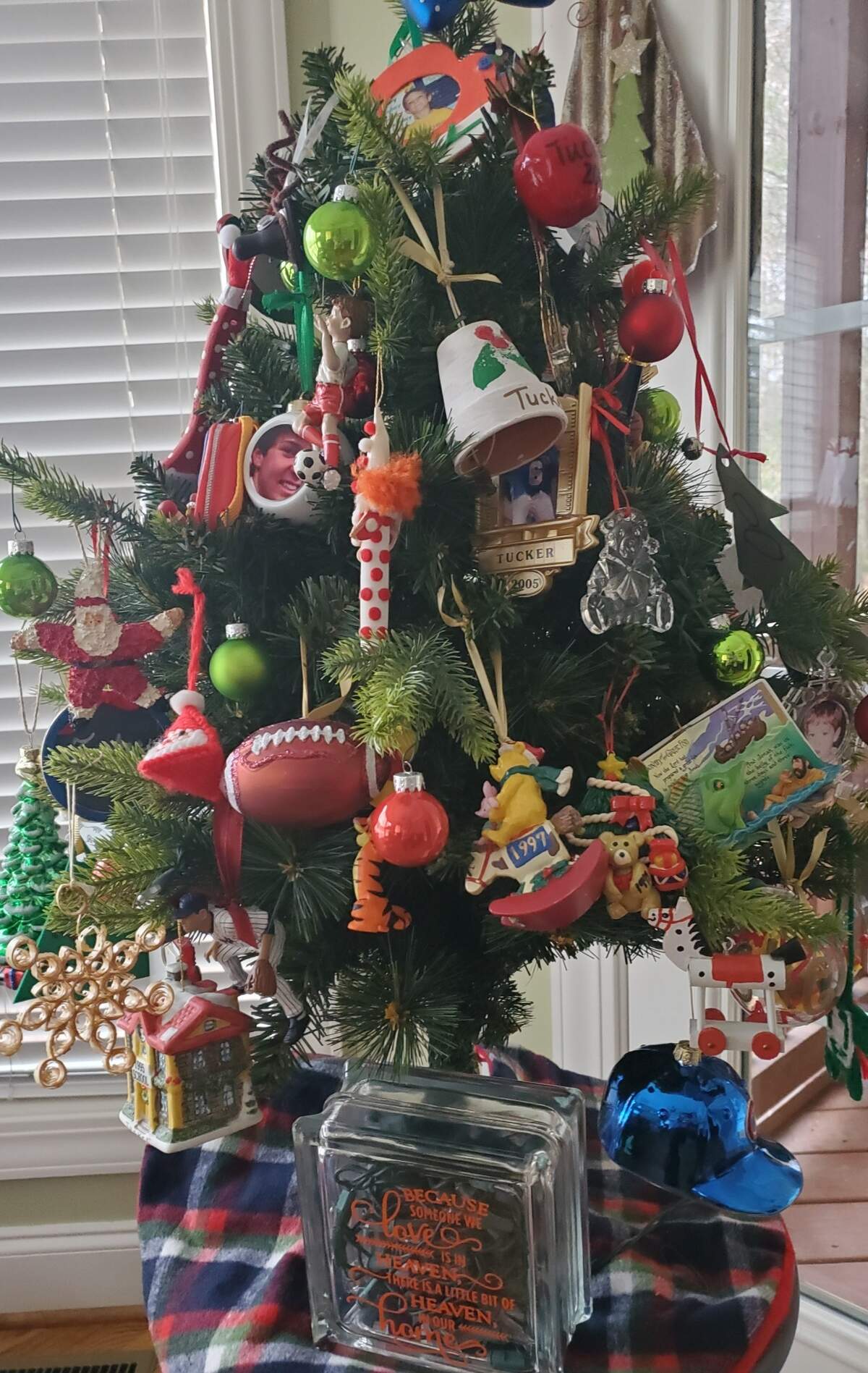 Cindy Hipps adorns a tree each year with special ornaments from her son, Tucker.
