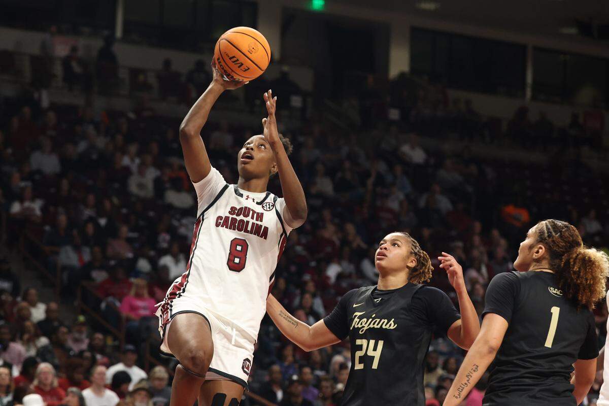 University of South Carolina's Joyce Edwards (8) shoots as Anderson's Kyla Cain (24) and Ciara Harris (1) look on during the second half of action at the Colonial Life Arena on Friday Oct. 24, 2025.
