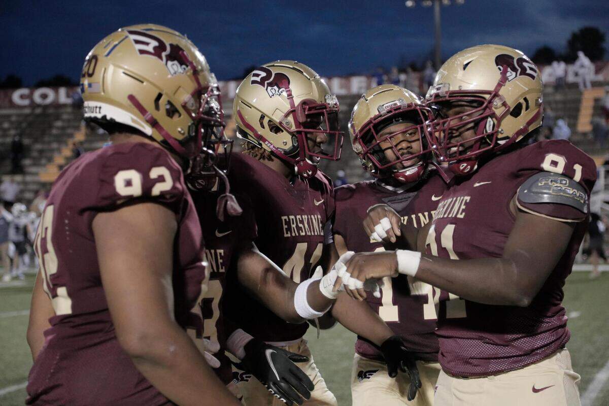 Erskine College speak to one another after losing to Shorter University on Saturday, March 13, 2021.