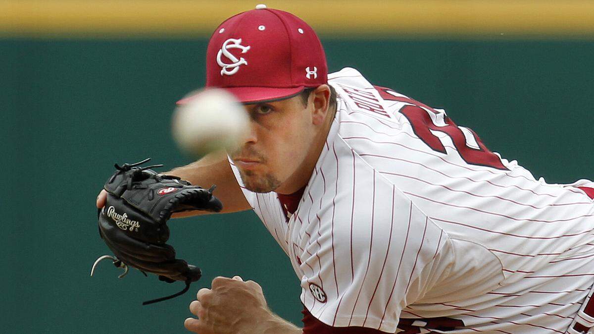 USC’s Michael Roth delivers a pitch in the first inning during the first game of the Gamecocks series against LSU at Carolina Stadium, Friday, May 18, 2012.