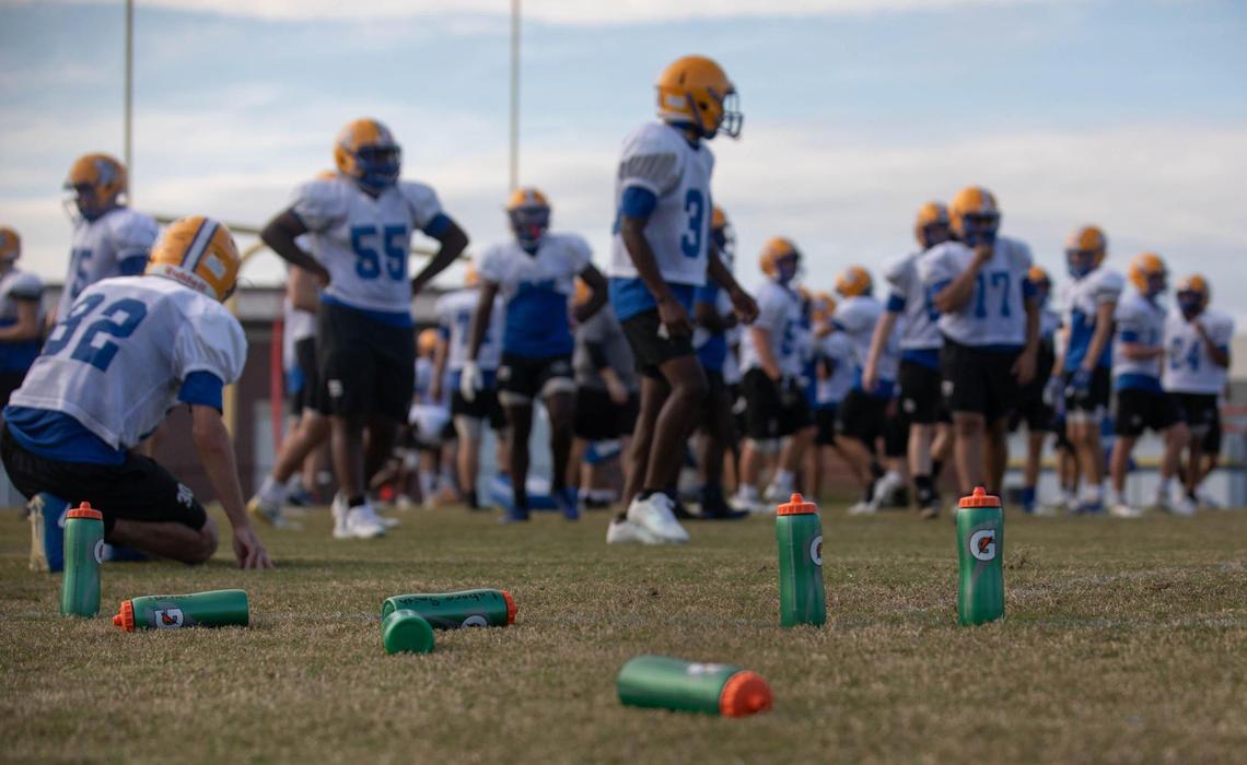 One measure football teams are taking to help prevent the spread of the coronavirus is for every player to have their own water bottle.