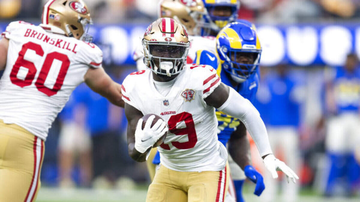 San Francisco 49ers wide receiver Deebo Samuel (19) runs with he ball during an NFL football game against the Los Angeles Rams Sunday, Jan. 9, 2022, in Inglewood, Calif.