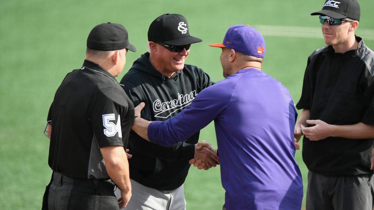South Carolina baseball coach Paul Mainieri (left) and Clemson baseball coach Erik Bakich (right) before a March 1, 2026 game at Clemson’s Doug Kingsmore Stadium