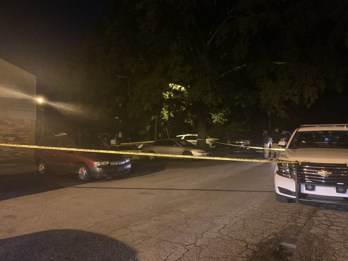 Police investigate a fatal shooting.