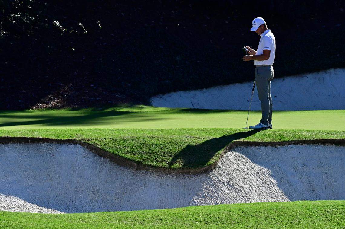 Lucas Glover prepares to putt at No. 12 during Round 2 of the Masters at Augusta National Golf Club, Friday, November 13, 2020.