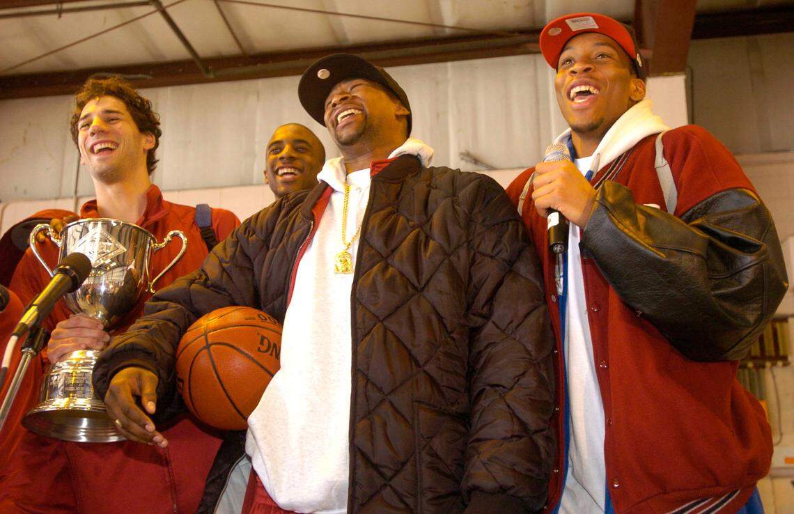 From April 1, 2005: The University of South Carolina basketball team, including from left, John Chappell, Brandon Wallace, Carlos Powell and Tarence Kinsey, address hundreds of cheering fans at Eagle Aviation after the Gameococks won the NIT.