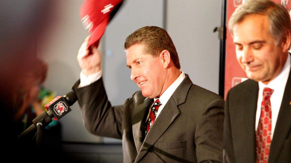 From 2012: Baseball coach Ray Tanner tips his baseball hat after being introduced as the next athletic director at the University of South Carolina by president Dr. Harris Pastides.