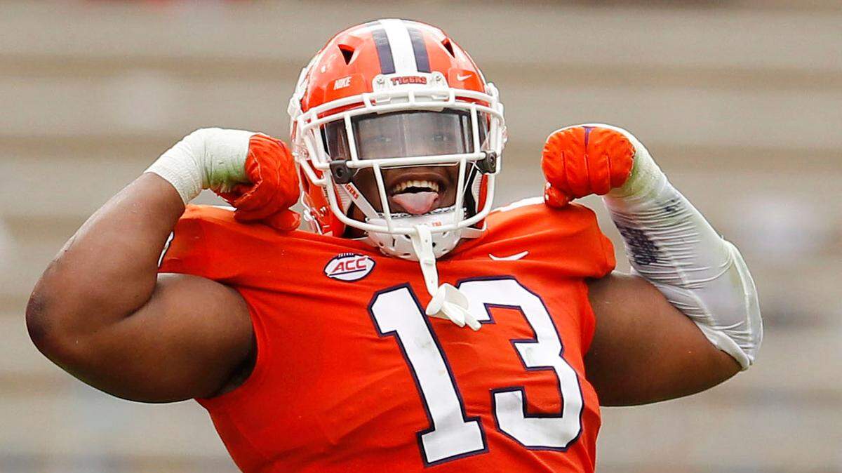 Clemson defensive tackle Tyler Davis (13) celebrates after putting a big hit on Georgia Tech during second-quarter action in Clemson, S.C. on Saturday, Sept. 18, 2021.