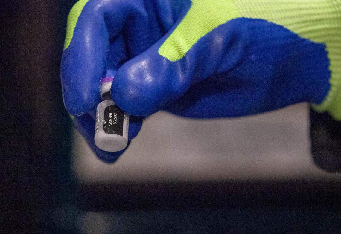 Pfizer/BioNTech Covid-19 vaccine arrival at MUSC. Some vials were removed from the freezer and moved to refrigerator for distribution in the first few days.