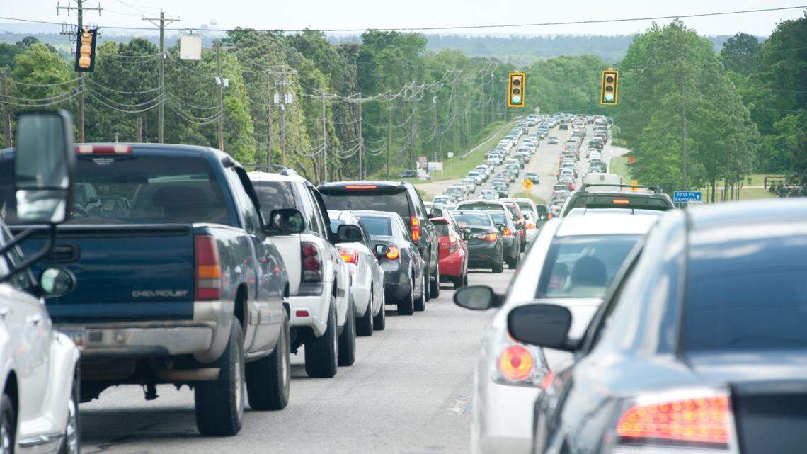 Traffic was backed up in both directions along Charleston highway as thousands of people tried to get to the first annual South Carolina Food Truck Festival & Craft Beer Festival at the South Carolina State Farmers Market on Sunday. Festival organizer Anne-Marie Aigner estimated attendance at 12,000 while admitting it was probably closer to 15,000. Many festival-goers reported standing in individual lines for over an hour.4/26/15