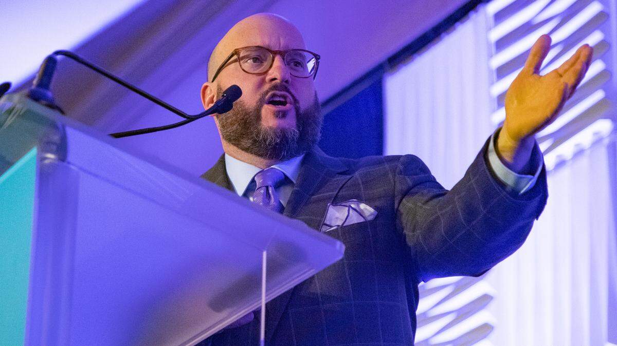 Trav Robertson, the chair of the South Carolina Democratic Party, speaks during the First in the South Dinner in Charleston, South Carolina on Monday, February 24, 2020. Robertson announced Wednesday he would not seek another term as party chairman.