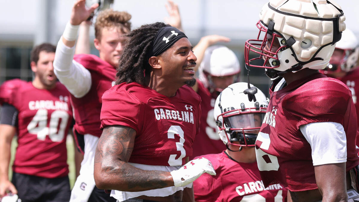 South Carolina wide receiver Antwane “Juice” Wells Jr. celebrates a play with teammates during practice in Columbia on Monday, August 7, 2023.