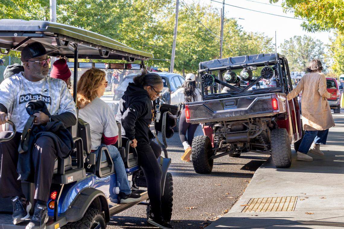 Passengers unload from golf carts behind Williams-Brice Stadium before USC’s game against Missouri on Saturday, Nov. 16, 2024