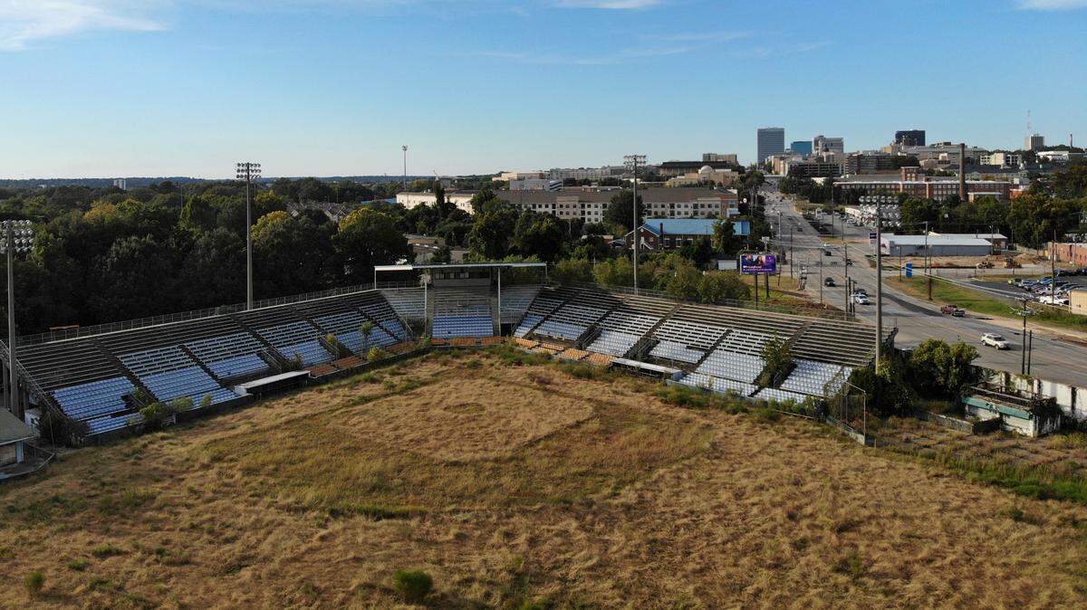 Capital City Stadium is overgrown and unused in Columbia, South Carolina, as seen on Tuesday, September 28, 2022. The city and developers have tried to tear down the old baseball stadium for years.